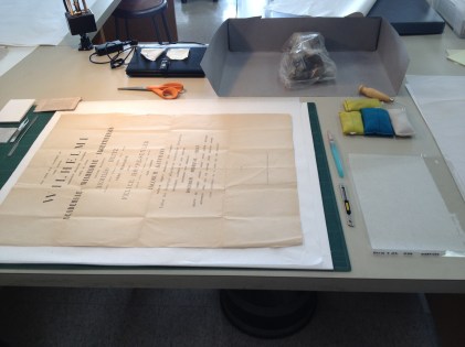 Repairing paper certificates in the conservation lab.