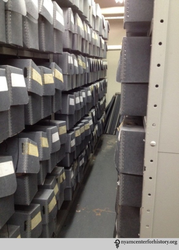 Previous storage space, with overstuffed document boxes.