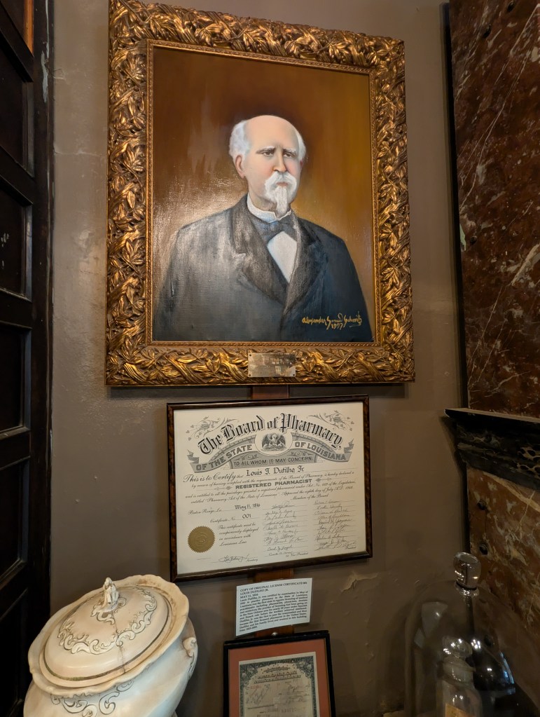 A portrait of Dufilho with his certification under it. 